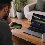 A man studying football betting odds