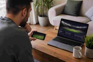 A man studying football betting odds